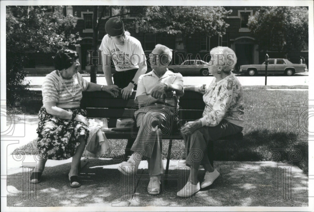 1991 The Guardian Angels talking to seniors - Historic Images