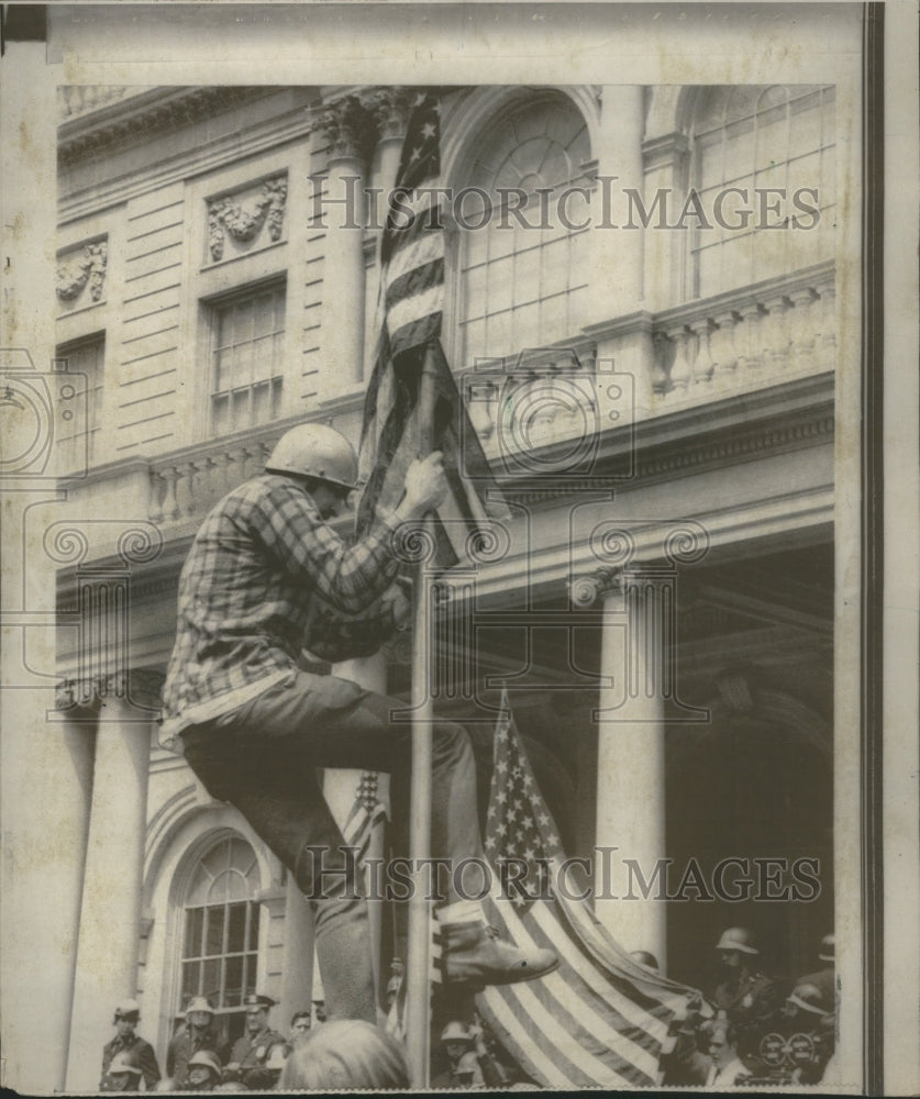 1970 Construction Crew Hangs American Flag - Historic Images