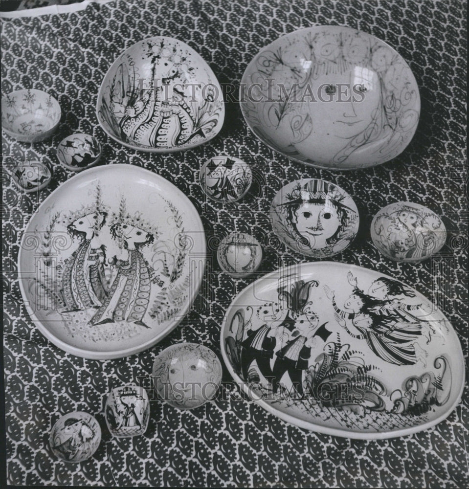1949 Finished decorative pottery plates. - Historic Images