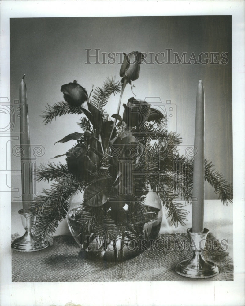 1979 A half dozen roses and sprigs of pine - Historic Images