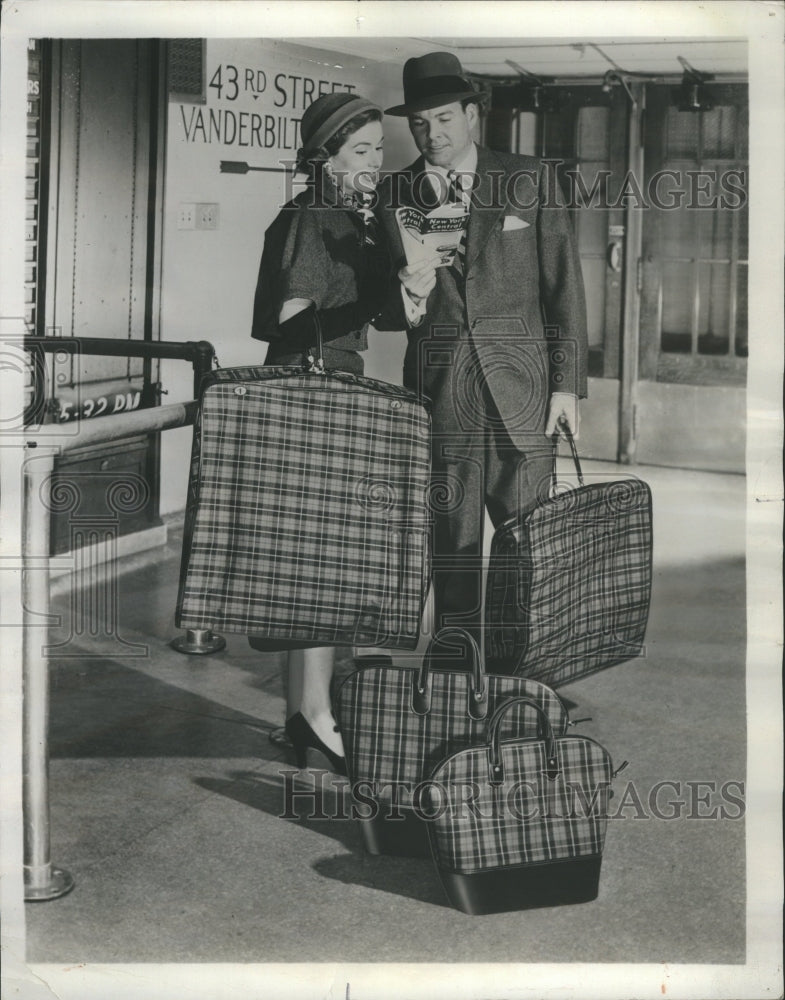1951 Womens Fashion Luggage Hanging Carrier - Historic Images