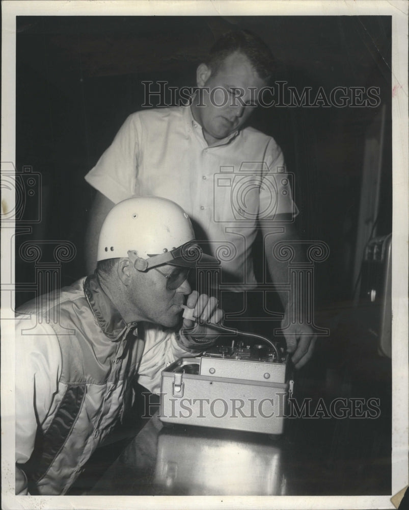 1962 Gearhardt gives breath analyzing test - Historic Images