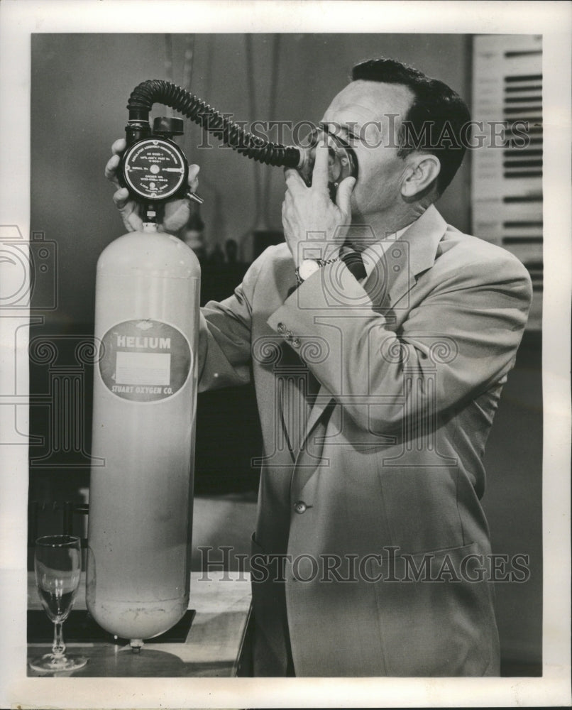 1956 Man Whiffing Helium MIS LA - Historic Images