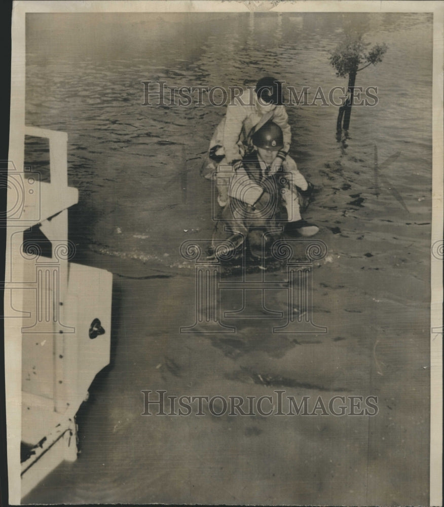 1956 Press Photo Floods Carried to Safety - Historic Images