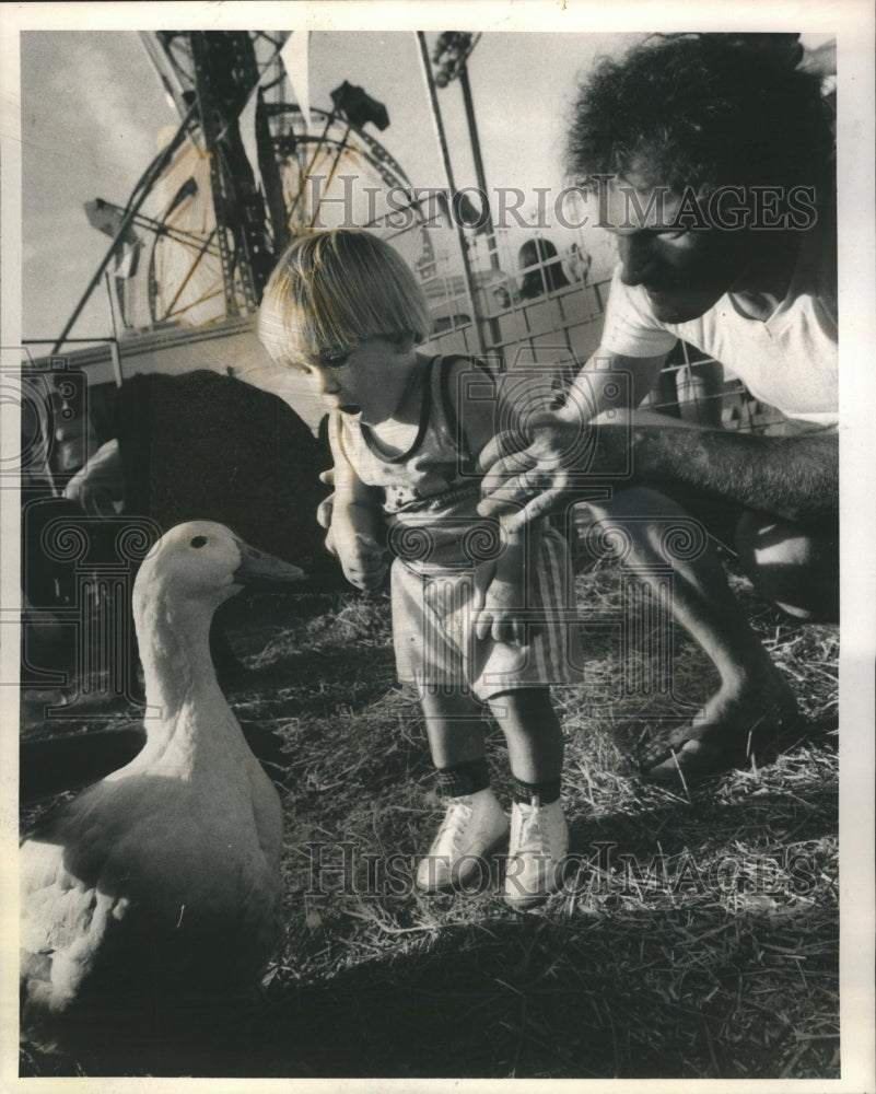 1984 Back Yards Fair Petting Zoo Child - Historic Images