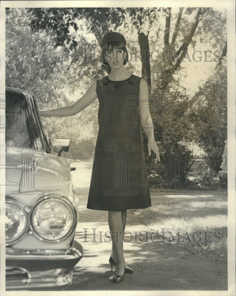 1965 Trimmed Shallow Black Suede Fleur - Historic Images