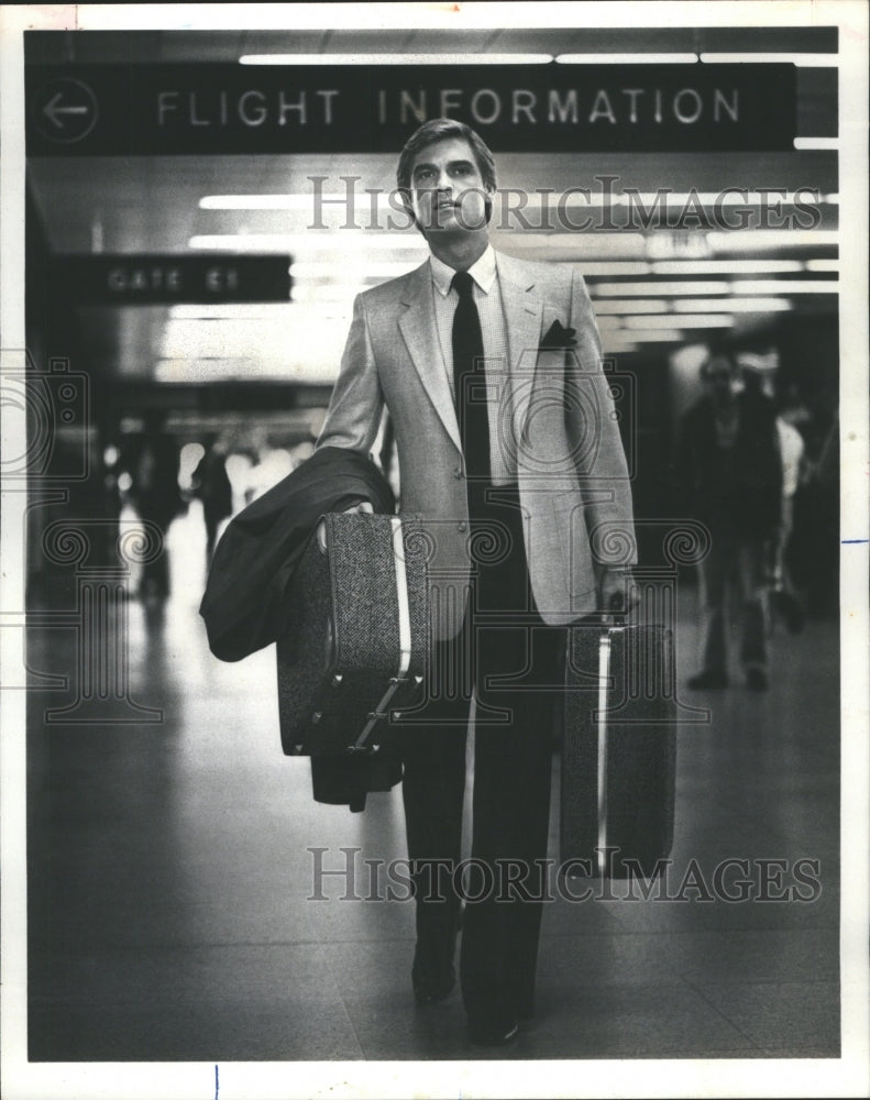 1980  Economy Forces Vacationers Luggage - Historic Images