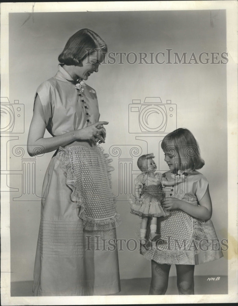1955 Apron Lacy Pattern Dolly Chciago - Historic Images