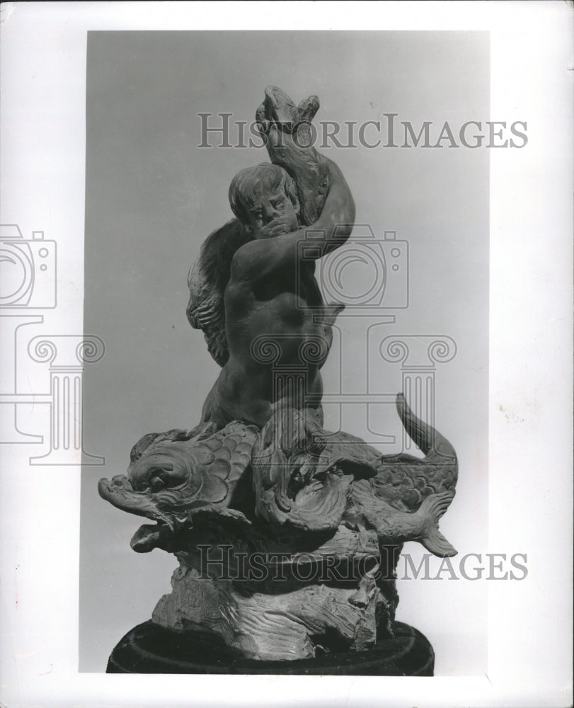 1958 Man holding Sea Serpent - Historic Images