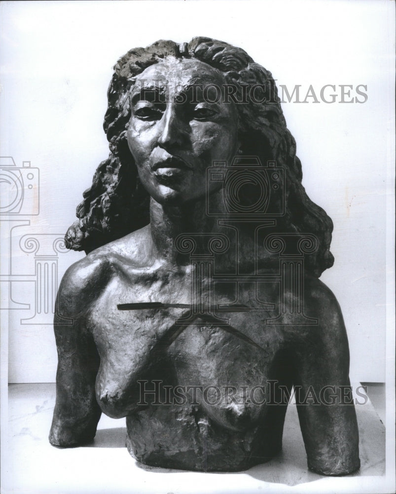 1963 Bronze bust of lady with no shirt - Historic Images