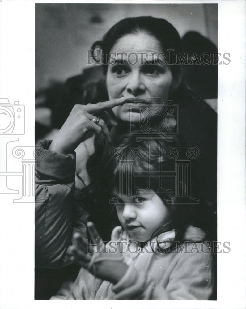 1991 Holding Joanna Alvarez waits - Historic Images