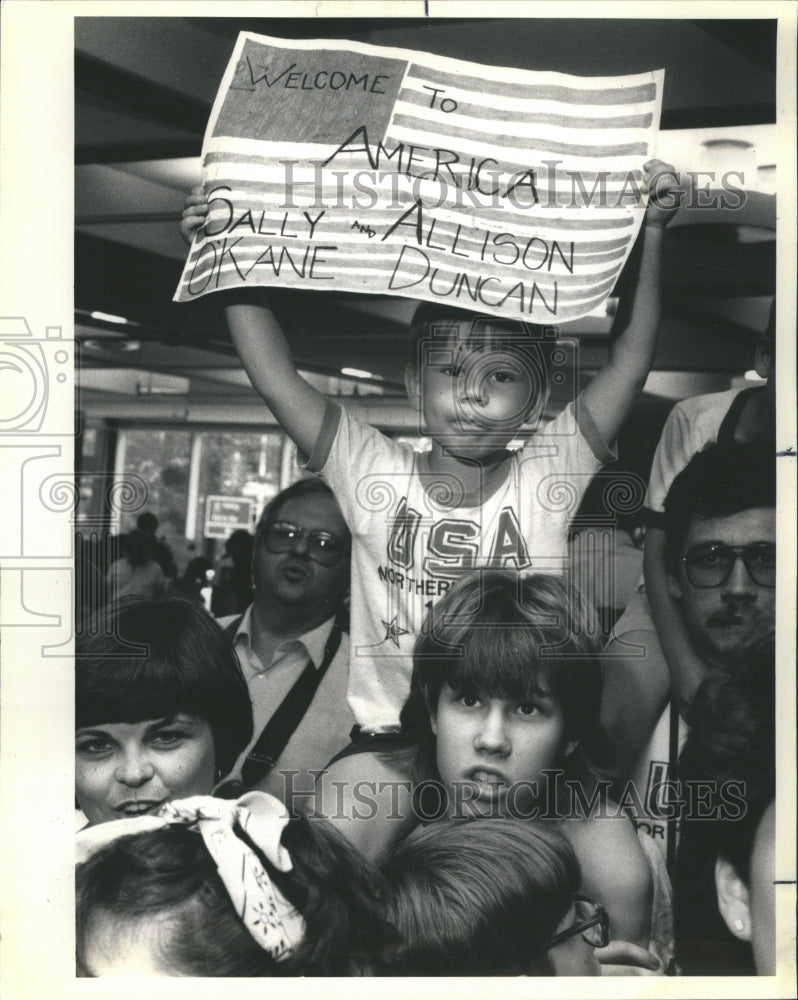 1985 Shermachs at O&#39;Here Airport with sign - Historic Images