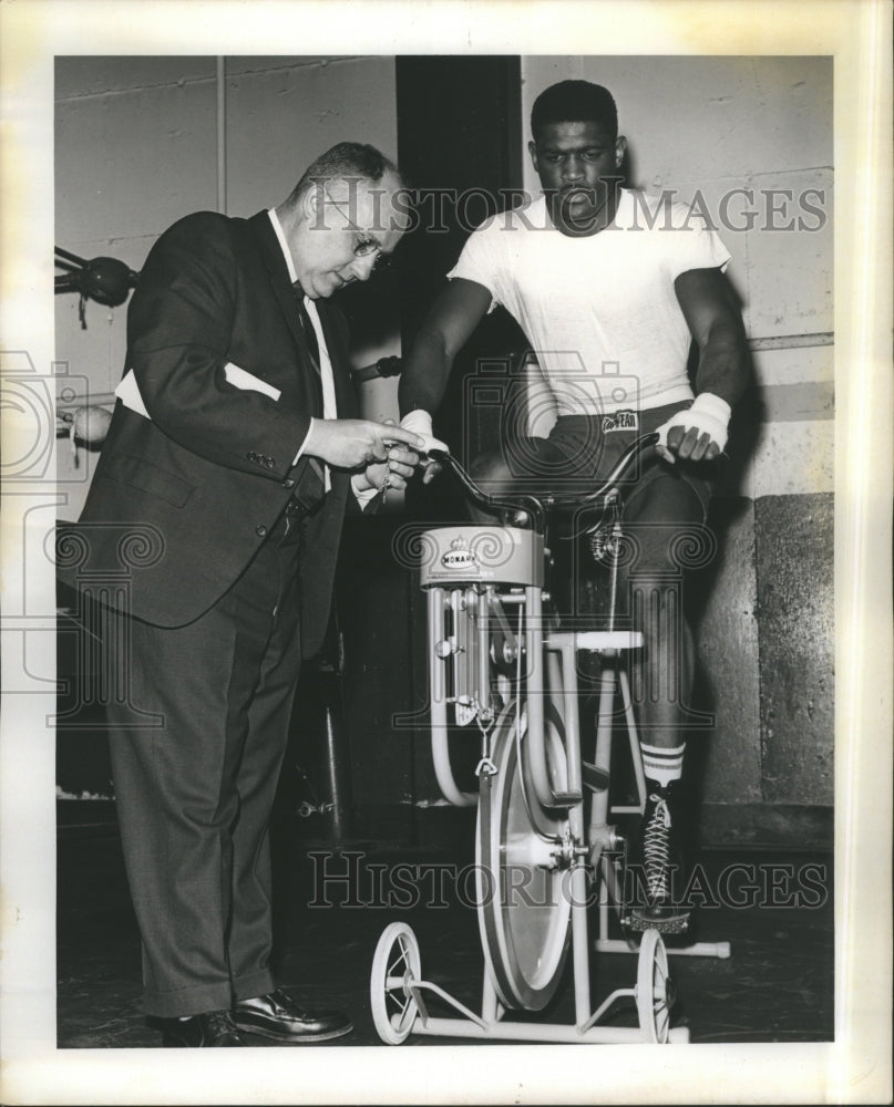 1985 Athlete Using Portable Cycle Ergometer - Historic Images