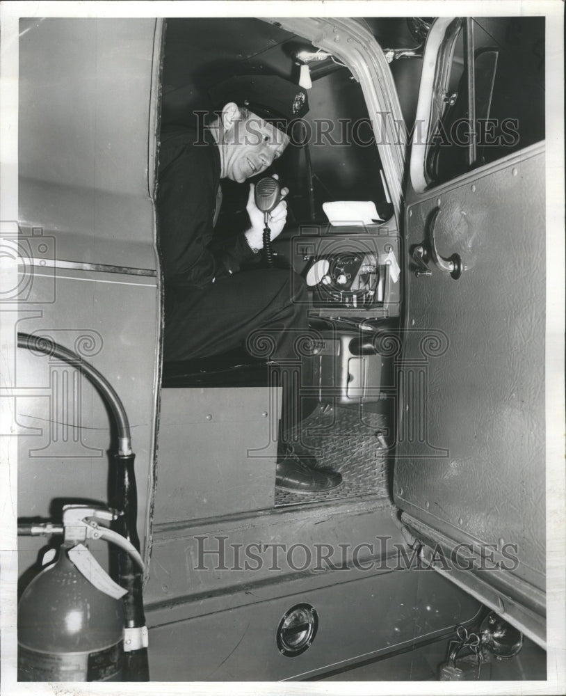 1958 Press Photo Volunteer Firefighter in Truck Radios - RRR71501 - Historic Images
