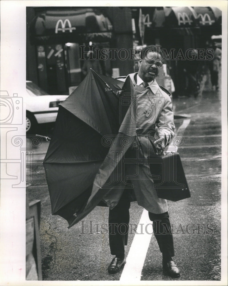 1990 African Amer. Man Inside Out Umbrella - Historic Images