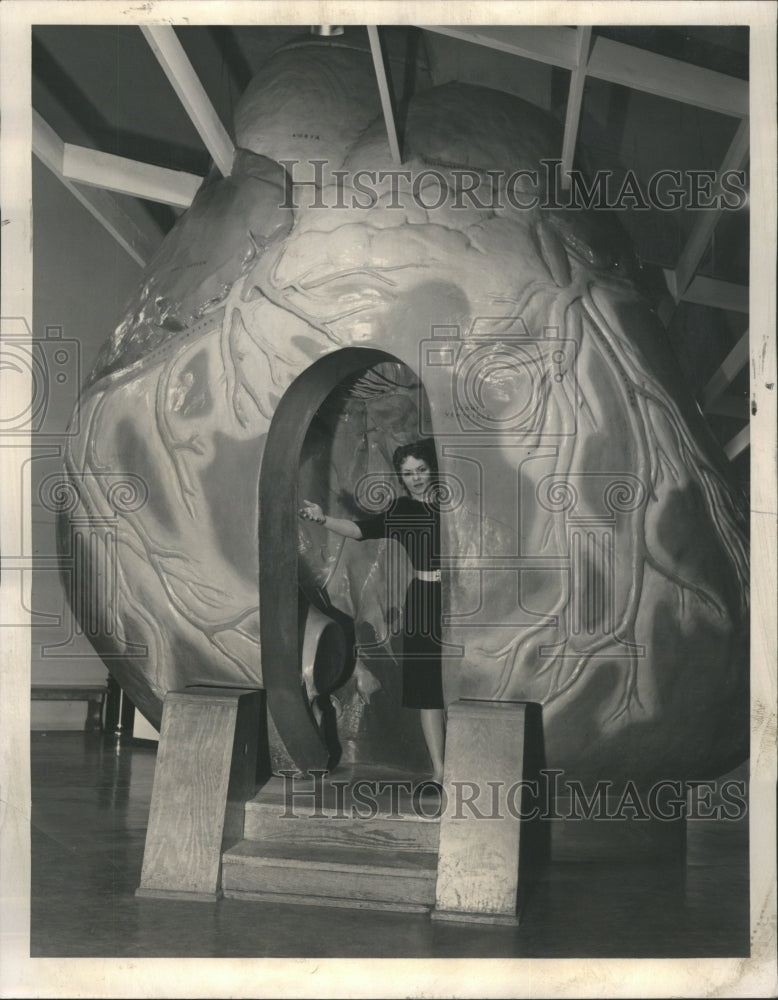 1961 Lady inside a 12-foot human heart - Historic Images