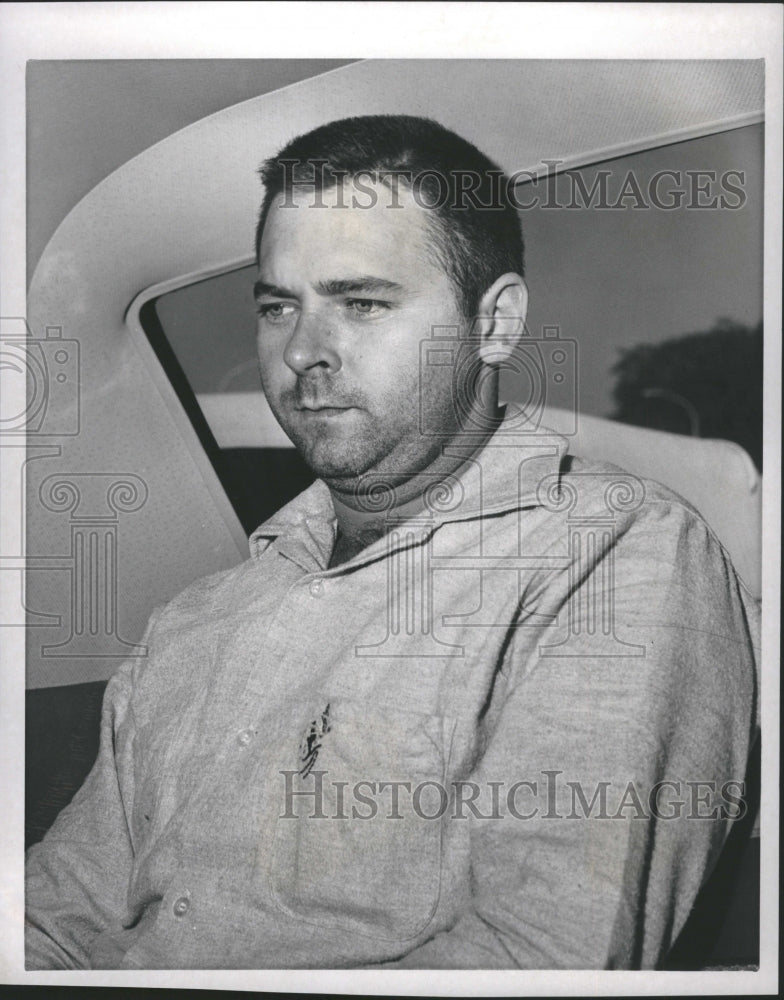 1964 W.G. Gravlin in police car for murder - Historic Images