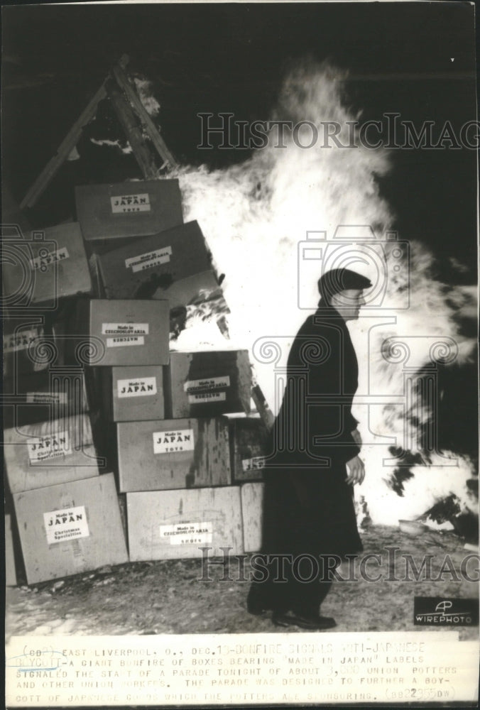  Boxes on fire with Japan lables. - Historic Images