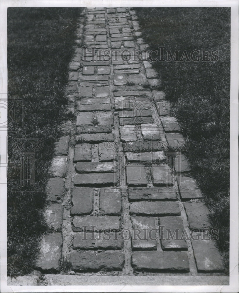 1950 A sidewalk made of bricks - Historic Images