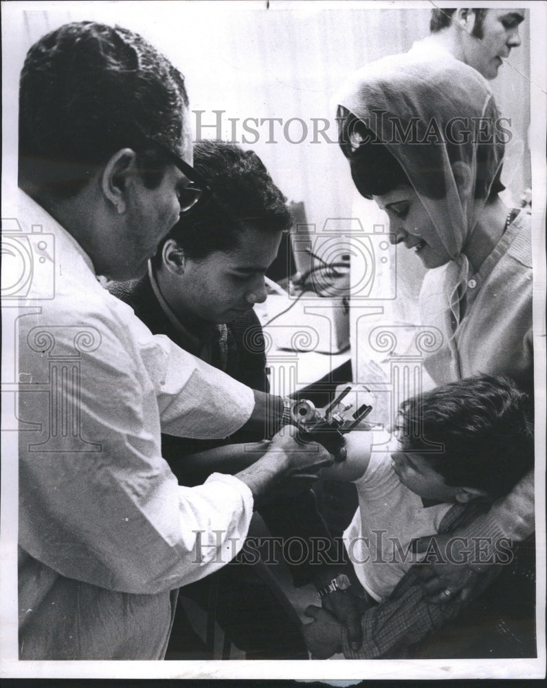 1970 Boy gets free diptheria shot,Urban Ctr - Historic Images