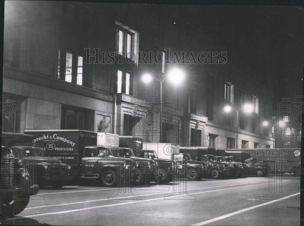 1960 Fleet of trucks on La Salle St. load - Historic Images