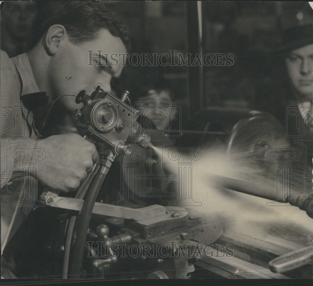 1935 Meyer demonstrating spraying machine - Historic Images