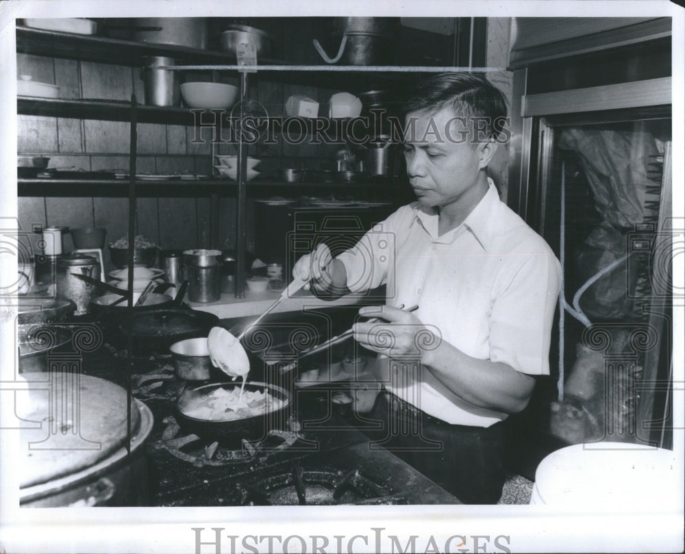 1979 Vietnam Refugee Makes Traditional Food - Historic Images