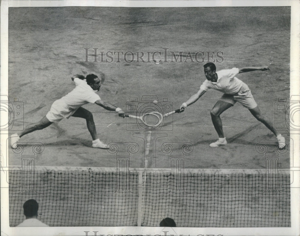 1955 Tennis Doubles Players Reach for Ball - Historic Images