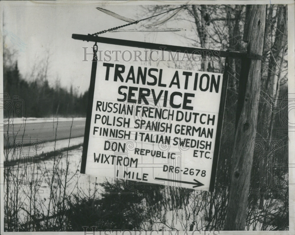 1960 Press Photo Sign: translation services, D Wixtrom - Historic Images