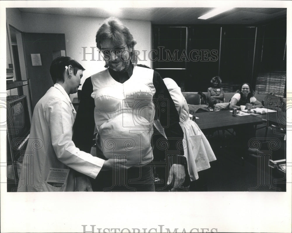 1990 Expectant Father Wears Empathy Belly - Historic Images