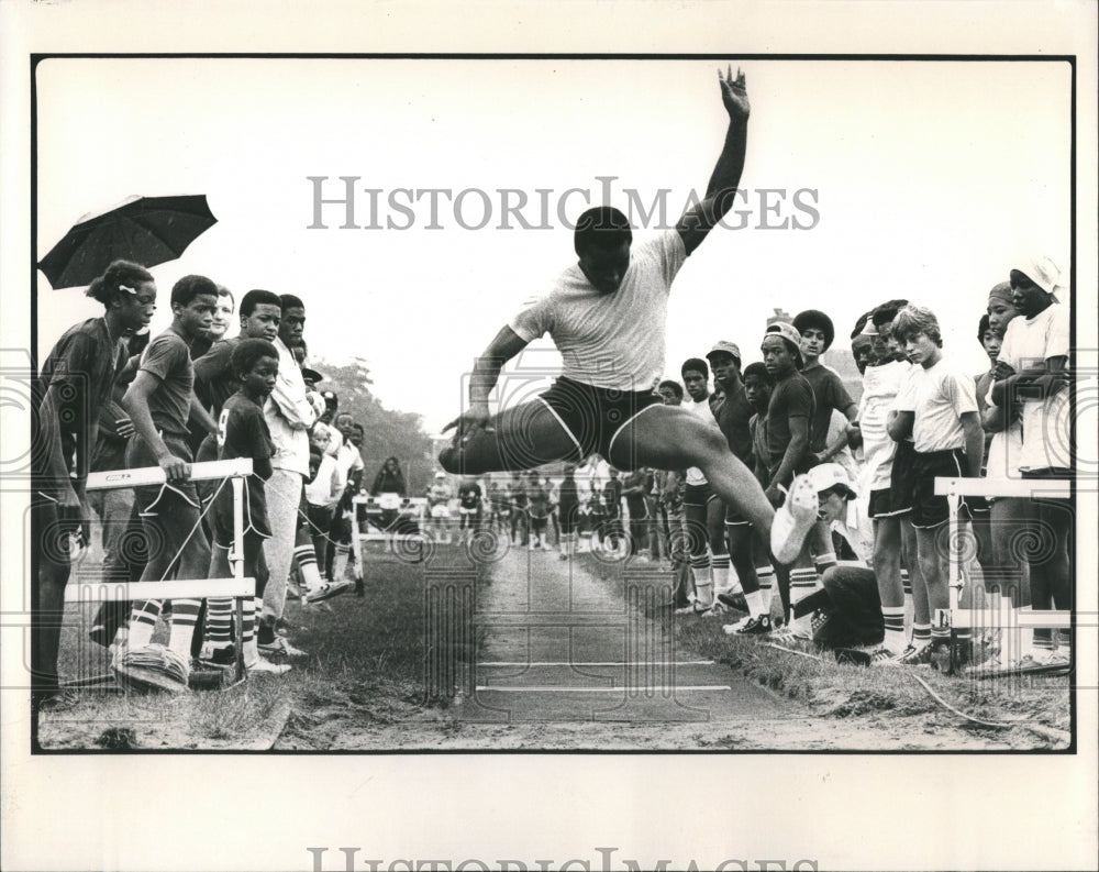 1980 Jesse Owens Roger Martin Long Jump - Historic Images