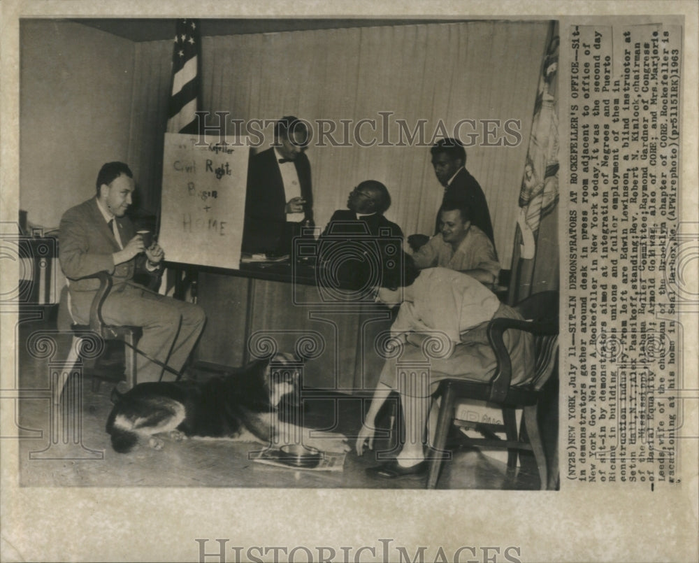 1963 Press Photo Sit in Demonstraters Rockefeller Desk - Historic Images
