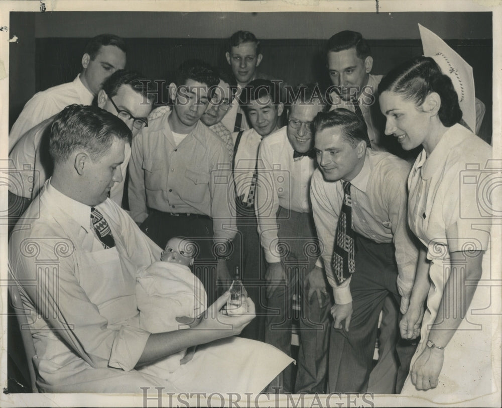 1949 Expectant Father Anderson Learns Feed - Historic Images
