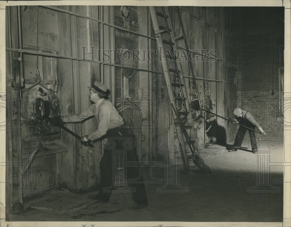 1939 Workers Help Incinerate Garbage - Historic Images
