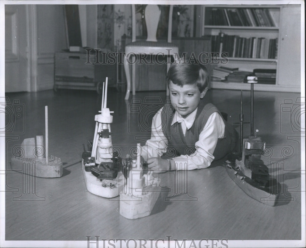 1956 Young Man Playing With Toy Ship Press Photo