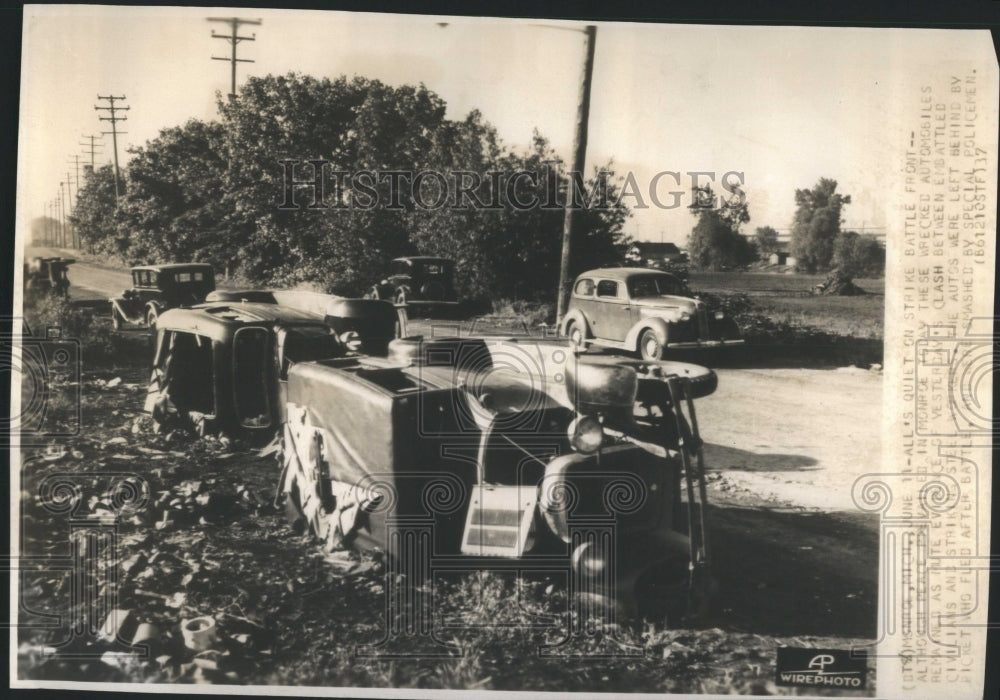 1937 Press Photo Wrecked Automobiles Following Strike