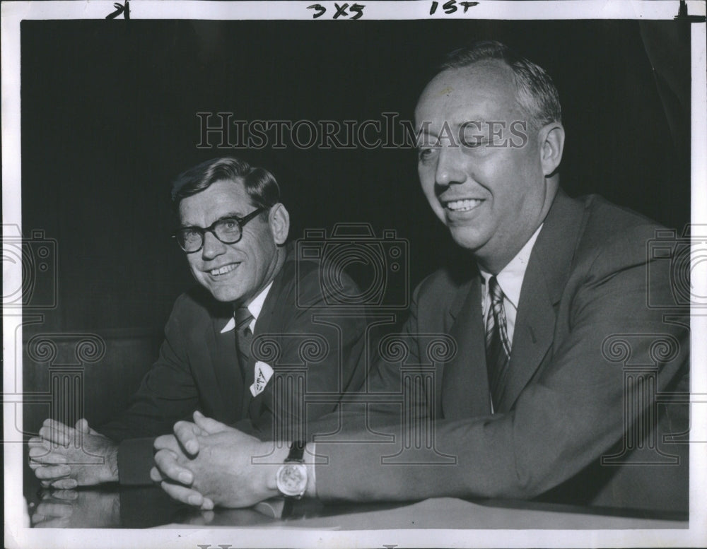 1956 Press Photo Guards Two People Smiling Coats