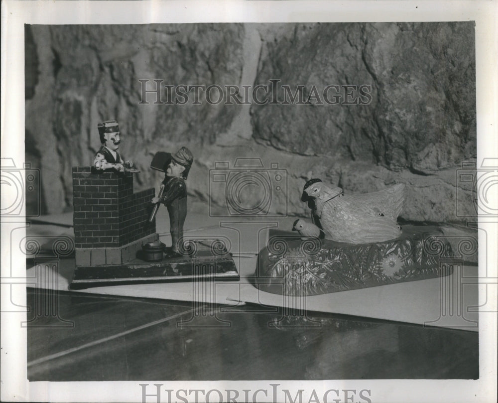 1951 Press Photo Brick Laying Mason Piggy Bank