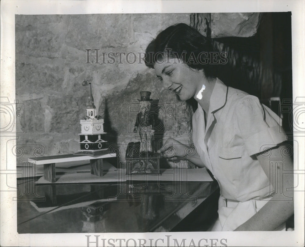 1951 Press Photo Patricia Coutternay places coin