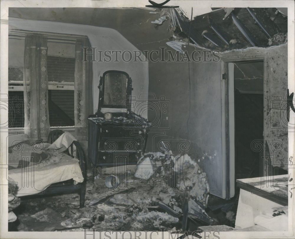 1949 Press Photo Second floor bedroom tank came through