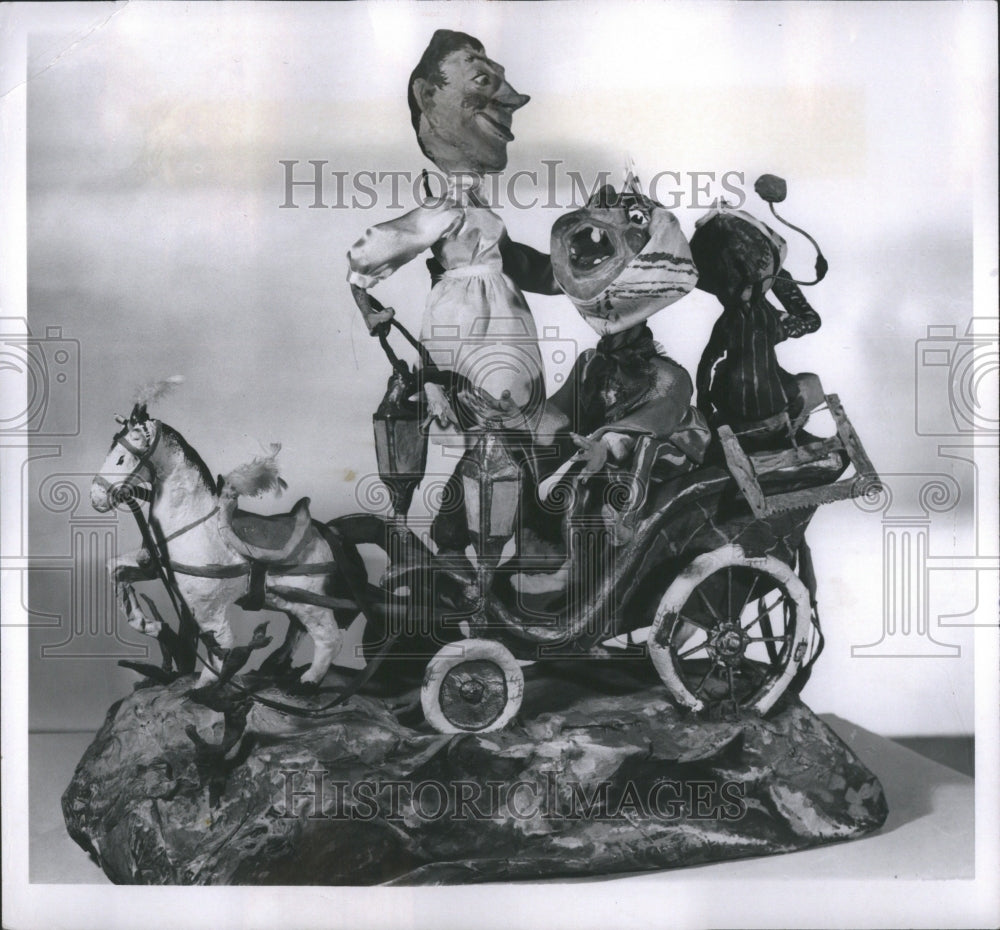 1958 Press Photo Miniature Statue Carriage Characters