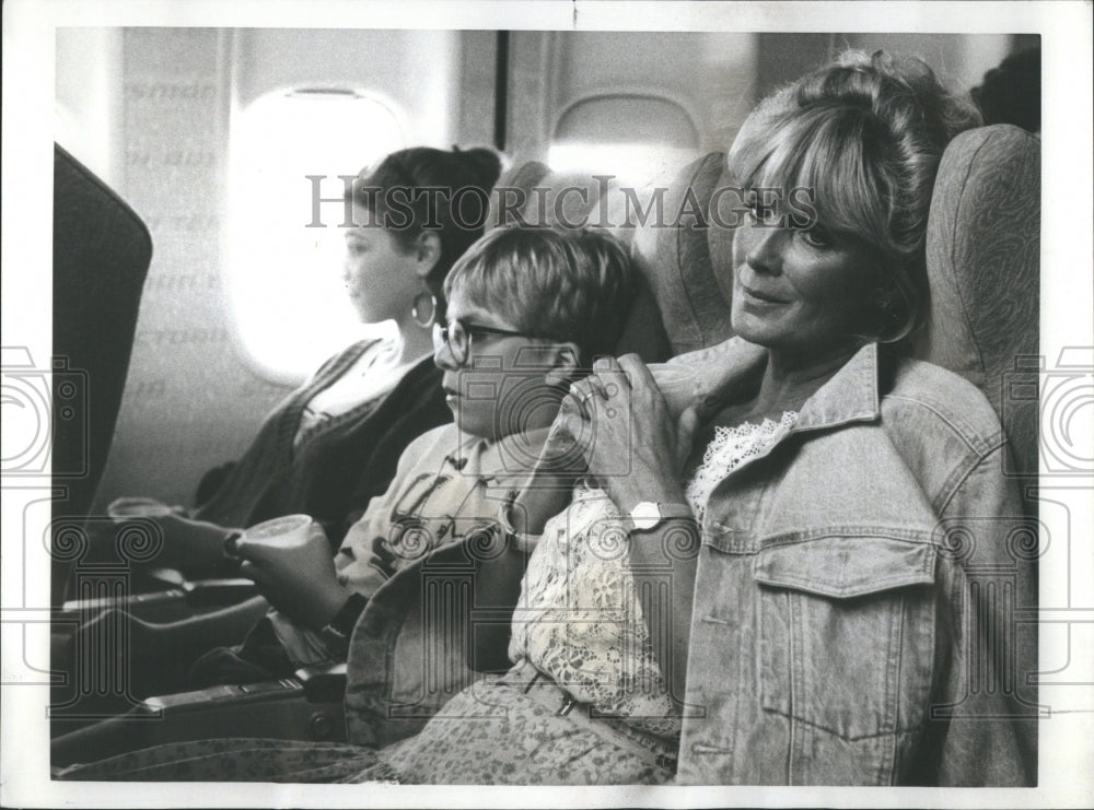 1986 Press Photo The Last Frontier, actors on a plane