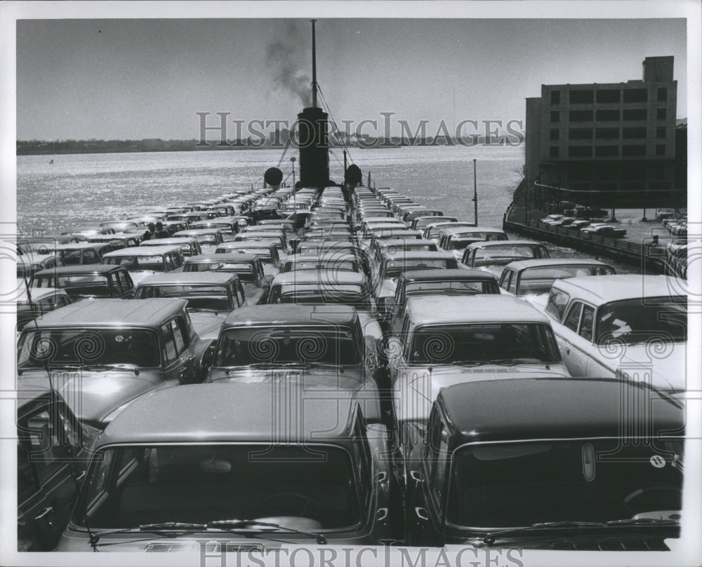 1960 Press Photo T.J. McCarthy loaded with cars