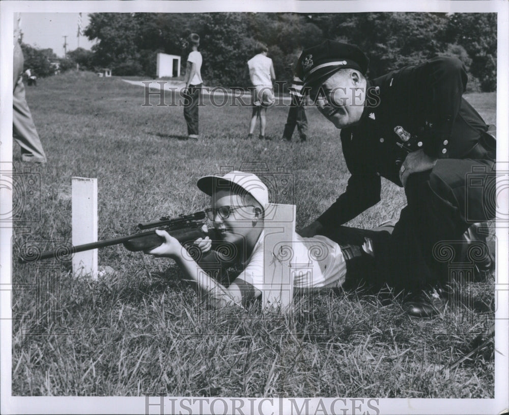 1955 Press Photo Shooting Missile Bows Crossbows Rocket