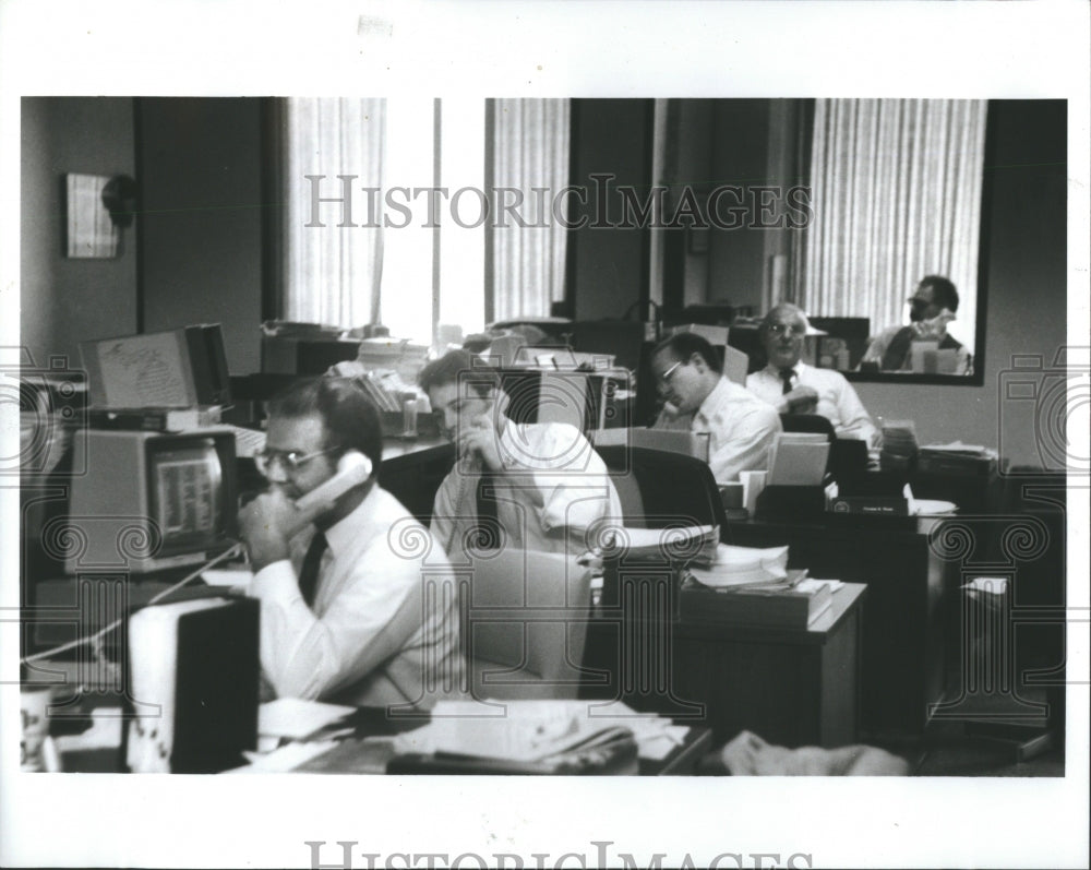 1987 Press Photo Stock Agency Professional Brokers