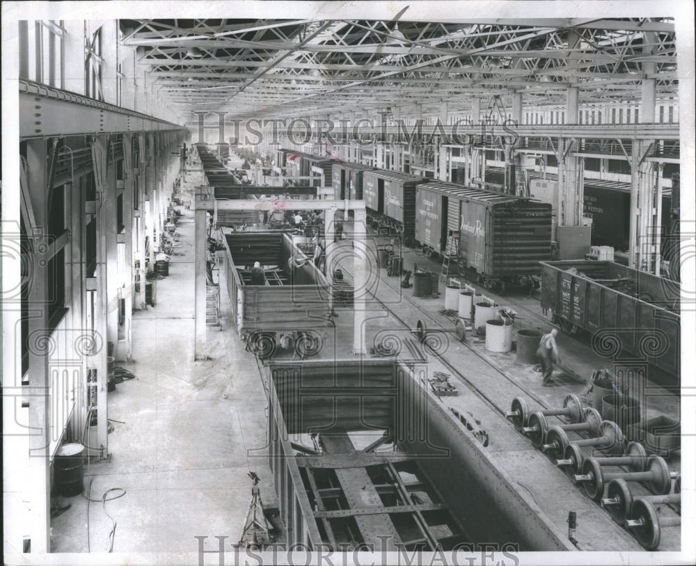 1957 Press Photo Reduction Line Chicago Clinton Lowa