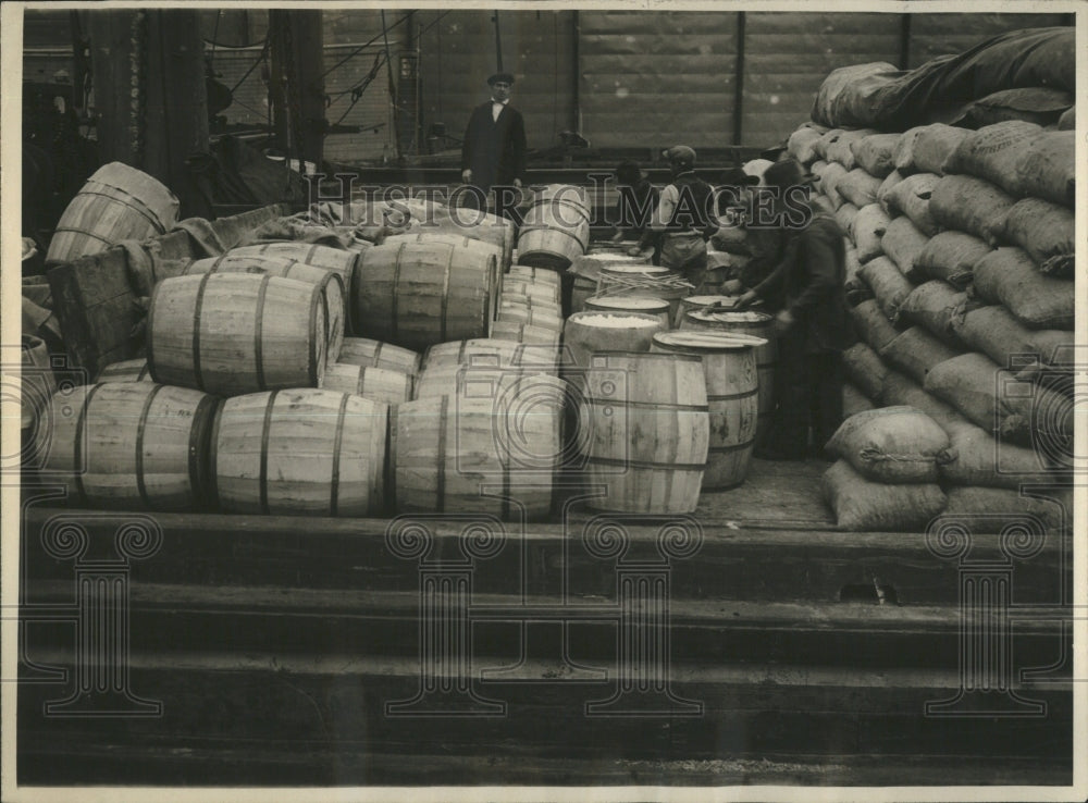 1919 Press Photo hundreds pounds sugar laying rears