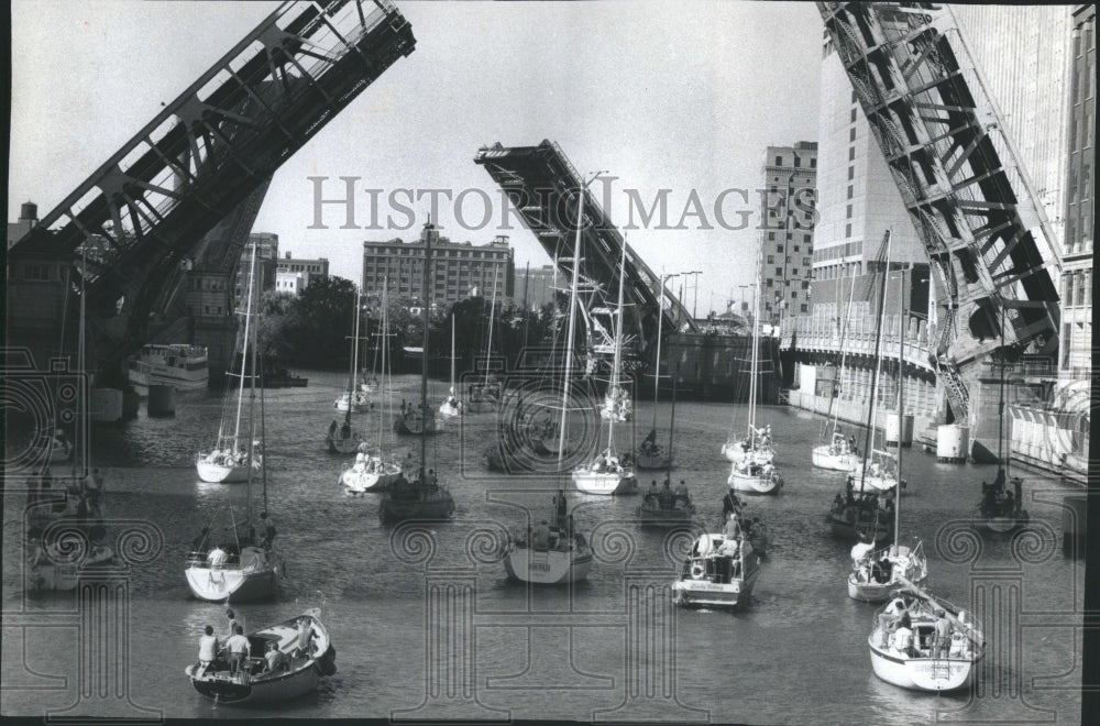 1990 Press Photo Several Sailboats Chicago River Return