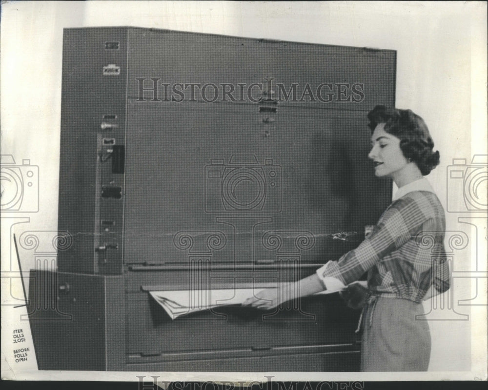 1961 Press Photo Machine Printed Sheets Poll Ejected