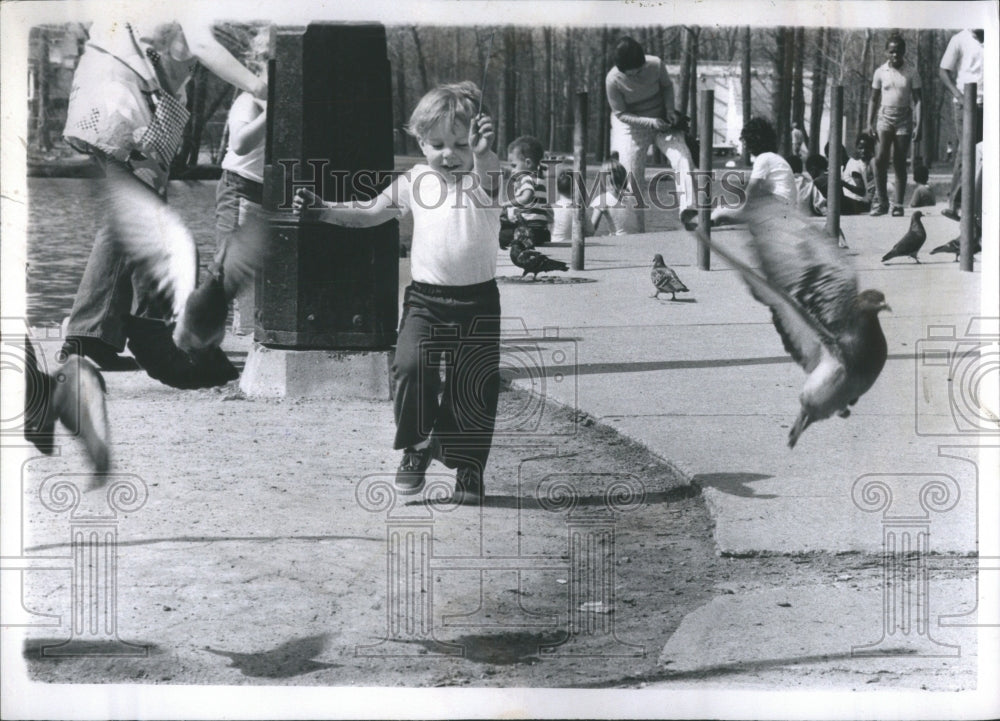 1973 Press Photo Spring time, children playing park